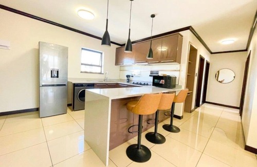 Greater Johannesburg Metropolitan Area Apartment | Relax & Unwind in a Stylish 3-Bedroom Midrand Getaway