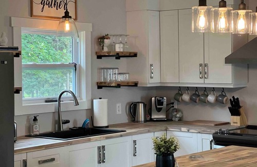 Harbour Grace House | Relax with the whole family at this quiet and peaceful getaway cottage.