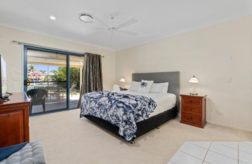 Banksia Beach House | Relaxation & Space in a Canal Home