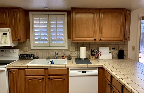 Flagstaff House | Relaxing Flagstaff Townhome Private Yard Work-Friendly Space Walking Paths