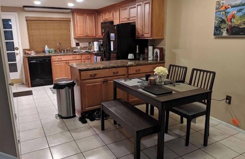 University House | Relaxing townhome with pool and lake