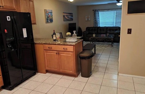 University House | Relaxing townhome with pool and lake