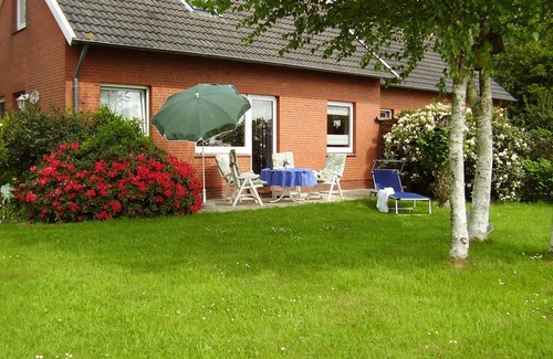 Groß Holum House | Relaxing vacation & family fun - holiday home with garden, WiFi and much more!