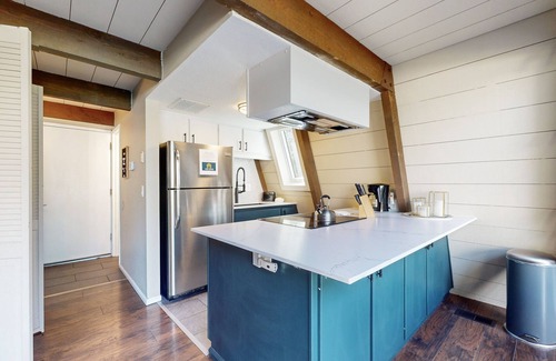 Overlook Park House | Remodeled home with a private hot tub, SHARC passes, & furnished deck