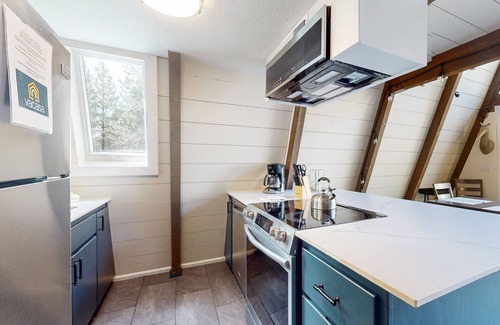 Overlook Park House | Remodeled home with a private hot tub, SHARC passes, & furnished deck