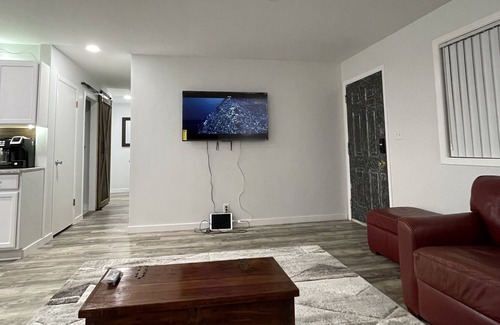 Lawrence House | Remote office get away with 1 gig wifi, huge deck, huge back yard and fire pit.