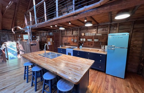 West Point Cabin | Renovated 3-BR boathouse built atop water in quiet cove; private float & trails