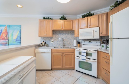 Tierra Verde Condo | Renovated 6/2023 Top Floor Balcony Water View 2B/2B, Pool, Hot Tub, Grill, WIFI