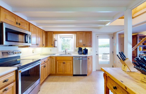 Alton Bay House | Renovated home with a water view, washer/dryer, AC, deck & wood stove