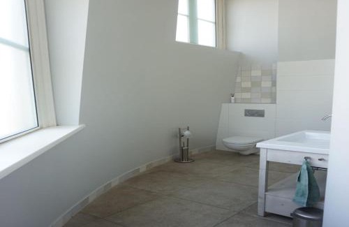 Vlissingen House | Renovated luxury water tower within walking distance of the beach boulevard