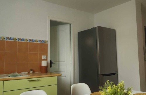 Pomerols Apartment | Renovated village house apartment with garage 10 minutes from the beach!