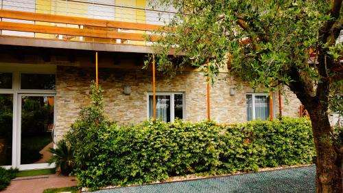 Riva del Garda Apartment | Residence Rivachiara (check-in at Hotel Riviera in Viale Rovereto, 95)