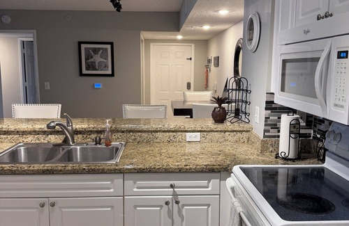 Tequesta Condo | Resort style condo, Ground level w garage, 5 min to beach, heated pool