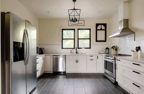 Hosford-Abernethy House | Restored Farmhouse & Backyard Tiny House Village