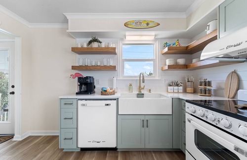 Pensacola Beach House | Retro beach house, 4-min walk to sand, bay views, bunk beds, pirate playset.