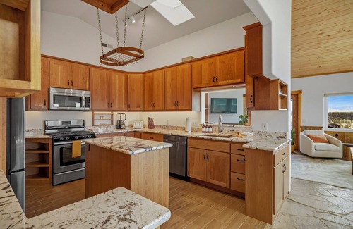 Pagosa Hills House | Retro-Modern, Mountain Retreat with 3 bedrooms, 2 baths, a bonus game room, office, and a beautiful deck with ample seating for enjoying the Stunning Mountain Peak Views. Best Views in town. Permit VRP-25-0317 Maximum Guest: 6