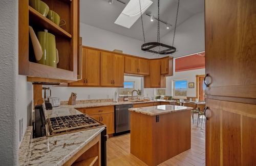 Pagosa Hills House | Retro-Modern, Mountain Retreat with 3 bedrooms, 2 baths, a bonus game room, office, and a beautiful deck with ample seating for enjoying the Stunning Mountain Peak Views. Best Views in town. Permit VRP-25-0317 Maximum Guest: 6