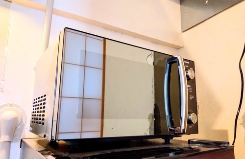 Yokosuka House | Retro Romantic Room! Private rooftop room with a view of Tokyo Bay beyond the Uraga Dock.