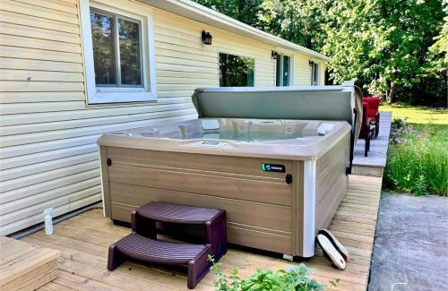 Mayfield House | River's Edge Hot tub dock trout fishing