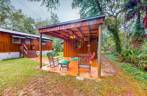 Bronson Cabin | Riverfront bunkhouse with private W/D, grill, & canoe