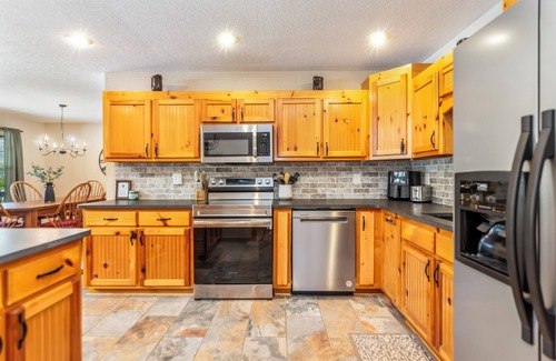 Hiawassee House | Riverfront cabin, 7 person hot tub, pool, trout fishing