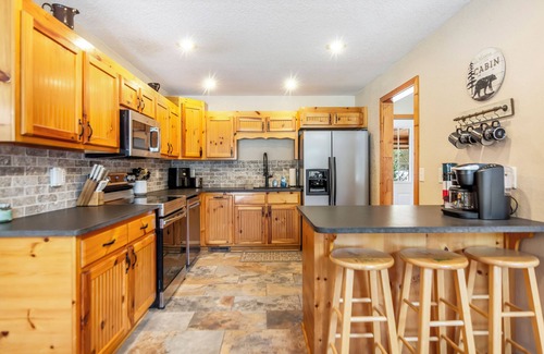 Hiawassee House | Riverfront cabin, 7 person hot tub, pool, trout fishing