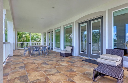 Tropic House | Riverfront Family Pool/Spa Game Rm 8bd/5.5ba 20ppl