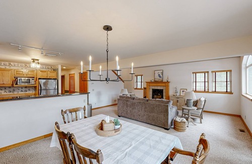 Sandpoint Cabin | Riverfront home with mountain view, hot tub, deck, WiFi, W/D, & fireplace