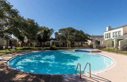 Sailhouse House | Rockport Racquet and Yacht Club condo with lovely bay views, tree covered grounds, pool, and fishing!