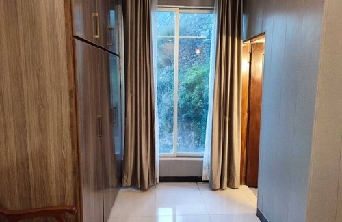 Dhirkot Apartment | Rockwood Heights Family Suite