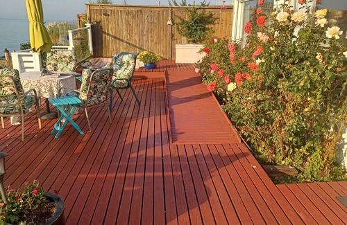 Fairfield Cottage | Romantic Waterfront apartment. Sunrises/Sunsets from Deck.