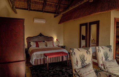 Mookgopong House | Room in Guest Room - Mmakuba Private Game Lodge, Deluxe Chalet 8A