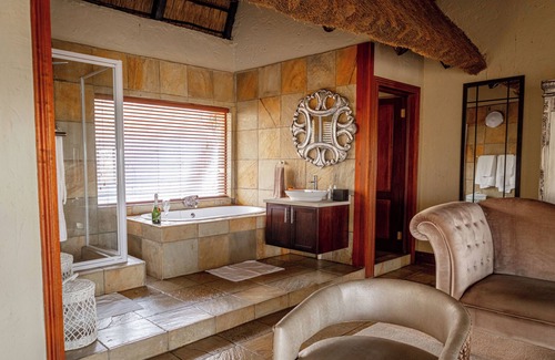 Mookgopong House | Room in Guest Room - Mmakuba Private Game Lodge, Deluxe Chalet 9A