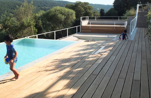 Aglientu Apartment | Room 'Jane Tarzan' with Shared Pool, Private Terrace and Air Conditioning