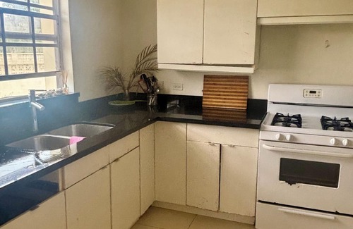 Clermont House | Room to Rent in Budget Friendly Bungalow with Island Breeze & Tropical Orchard