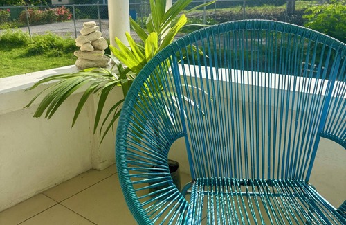 Clermont House | Room to Rent in Budget Friendly Bungalow with Island Breeze & Tropical Orchard