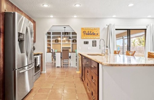 Royal Palm Beach House | Royal Retreat w/ Pool, Grill & Playground!