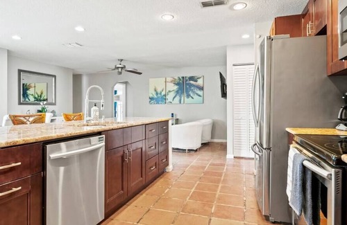 Royal Palm Beach House | Royal Retreat w/ Pool, Grill & Playground!