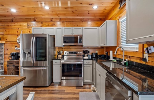 Sevierville Cabin | Rustic Mountain Retreat by Ghosal Luxury Lodging