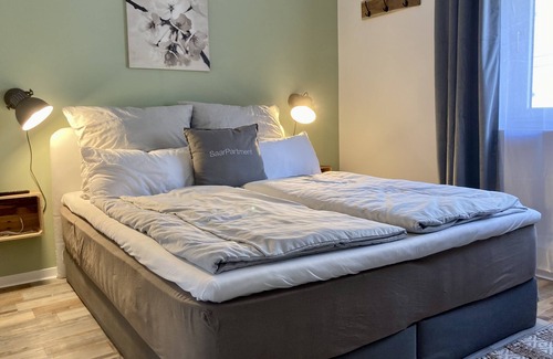 Mitte Apartment | Saarpartments, near main station -2 bedrooms, kitchen, bathroom, balcony, workation (parking opt)