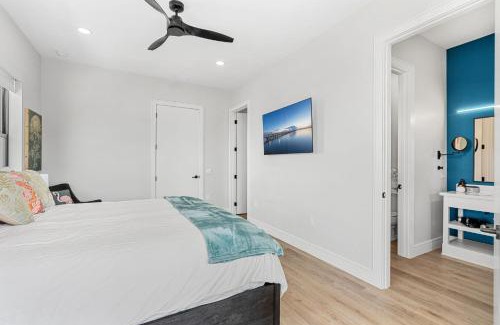 Cocoa Beach Villa | Salty Serenity Villa - New Luxe Escape with Hot Tub Spa & Rocket Views - Walk to Beach
