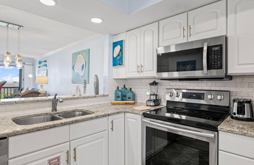 Sandestin House | Sandestin Starfish: Serene Bayfront Condo with Golf Cart, Workstation, and Stunning Views