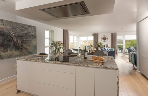 Holywell House | Sandyford - A superb beach house with sea views and parking in an exclusive development overlookin