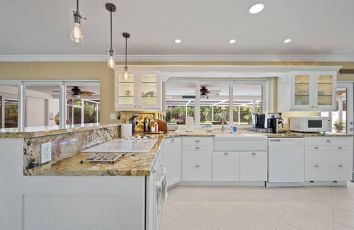 Deerfield Beach House | Screened-In Heated Pool and 5 min from the beach. Child friendly.