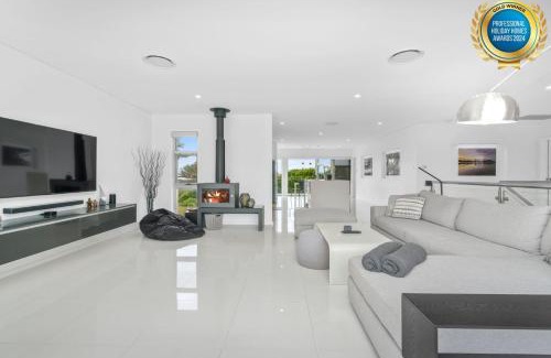 Culburra Beach House | Sea La Vie - Pet Friendly with Fireplace and Swimming Pool & Spa