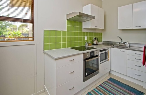 Papamoa Beach Cottage | Sea Peeks Holiday Home