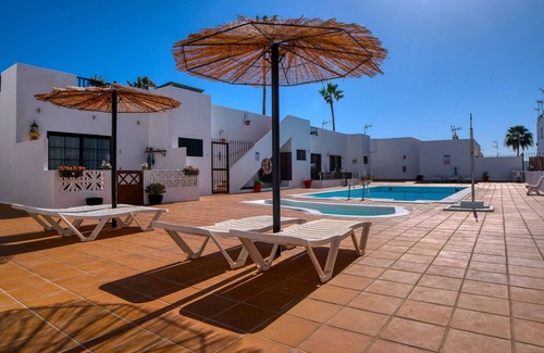 Puerto del Carmen Ski Chalet | Sea Waves Lanzarote - Large terrace, community pool, WiFi with fiber
