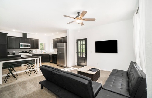 Honor Cottage | Secluded & contemporary cottage with a washer/dryer, central AC, & firepit