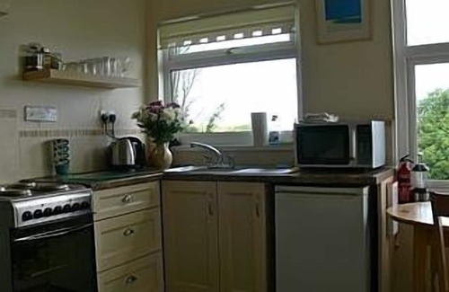 Lelant Apartment | Secluded Ground floor Apartment With Sea Views On Golf Course.