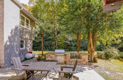 East Ellijay House | Secluded home on 6 acres with stocked pond, dock, outdoor kitchen, & fireplaces